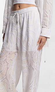 Брюки с вышивкой из рами