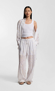 Брюки с вышивкой из рами